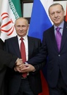 Syrie: Russie, Iran et Turquie d'accord pour réunir régime et opposition à Sotchi